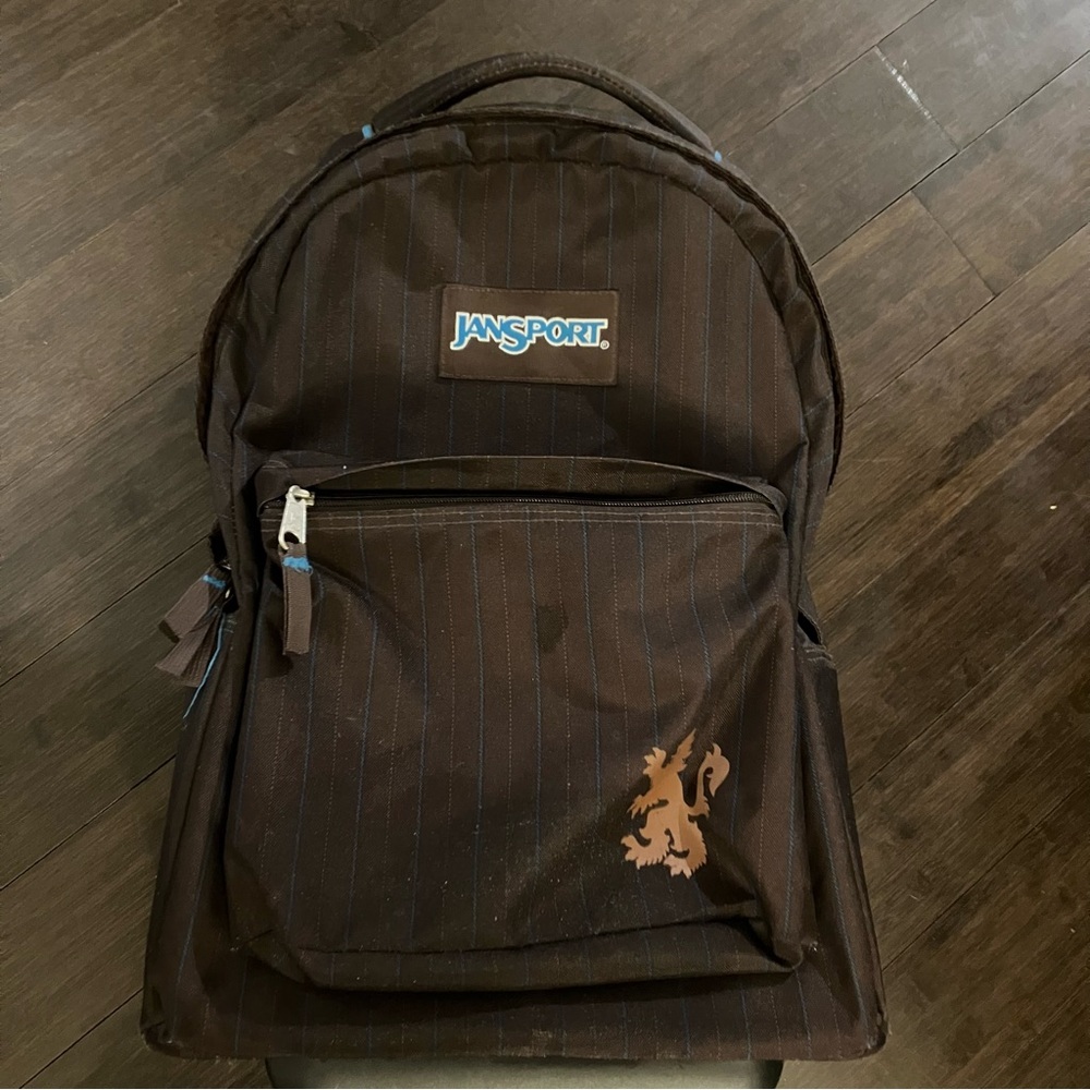 Jansport rolling backpack / Carry on luggage. zip up. Extending handle. EUC!